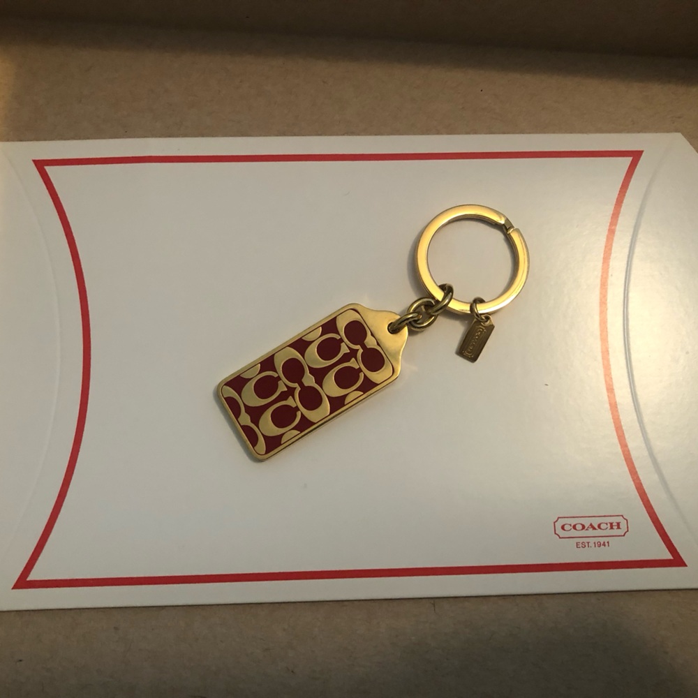 Coach - gold tone and pink signature C key ring
